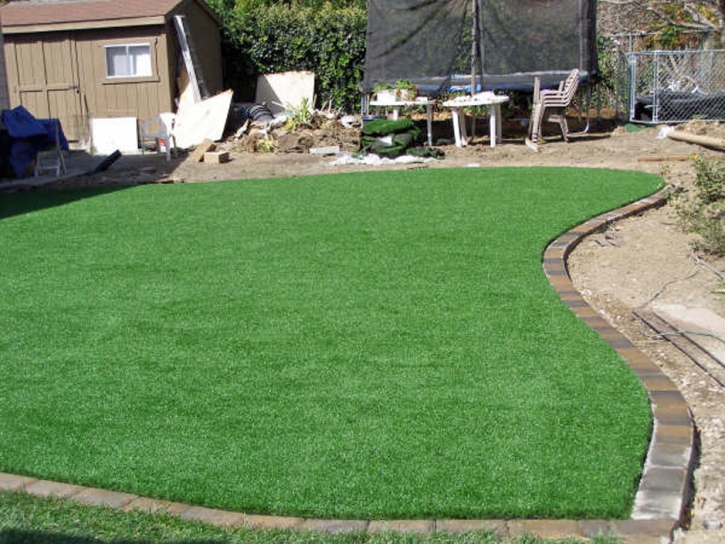 Faux Grass Lake Clarke Shores, Florida Landscape Rock, Backyard Makeover